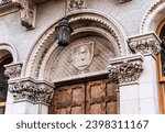 Tympanum of Museum Building in Caen stone, built in mid 19th century in the Campus of Trinity College, Dublin city center, Ireland