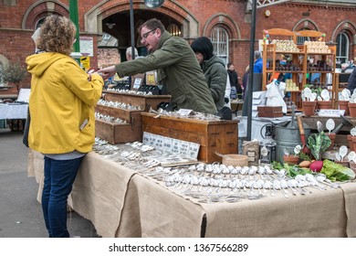 Tynemouth / Great Britain - April 06, 2019 : Tynemouth Metro Station Weekend Flea Market.  Stall Selling Decorative Spoons And Gifts