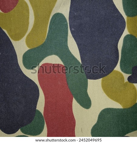 The type of backpack material is thick and has a striped pattern