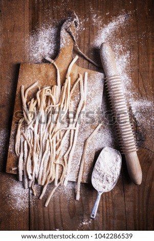 Similar – Image, Stock Photo Bread and flour on a rustic wooden background