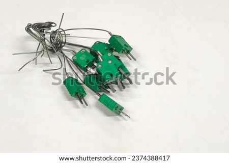 Type K thermocouples on a white background.