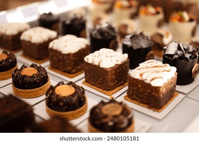 Types of cakes. Delicious cakes in bulk at the patisserie counter - Powered by Shutterstock