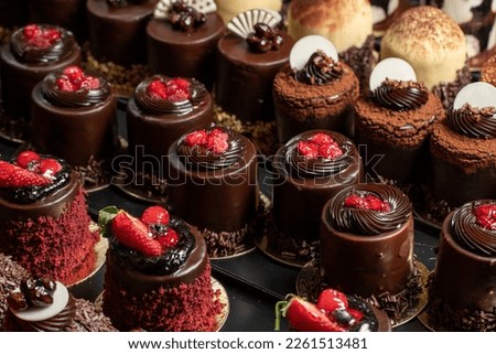 Types of cakes. Delicious cakes in bulk at the patisserie counter. close up