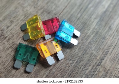 types of fuses blades various colors blurred isolated background. - Shutterstock ID 2192182533