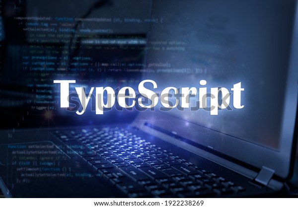 TypeScript\
inscription against laptop and code background. Learn programming\
language, computer courses, training.\
