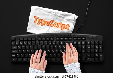 TypeScript programming language. Rag width word TypeScript and hands on pc keyboard 