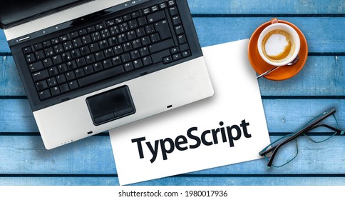 TypeScript Programming Language. Word TypeScript on paper and laptop