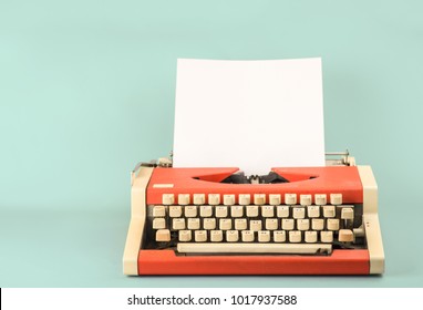 Typewriter on a blue background