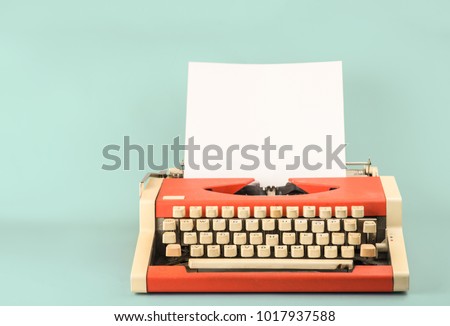 Typewriter on a blue background