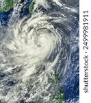 Typhoon Nanmadol. Acquired August 27, 2011, this naturalcolor image shows Typhoon Nanmadol over the northern Philippines and the southern tip o Elements of this image furnished by NASA.