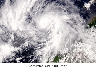 Typhoon Over Planet Earth - Satellite Photo. Elements Of This Image Furnished By NASA.