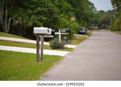 Typical American Outdoors Mail Box On Suburban Street Side