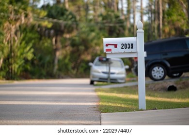 Typical American Outdoors Mail Box On Suburban Street Side