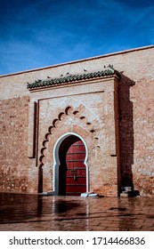 Typical arabic door next to Koutoubia mosque. 
Koutoubia mosque is the most largest and famous mosque in Marrakech, Morocco.