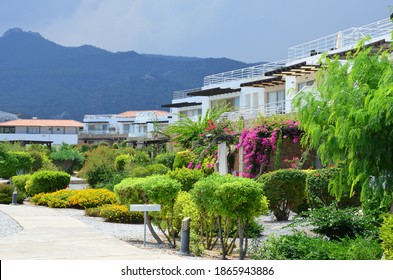 Typical Architecture In Cyprus. Modern Luxury Cottages, Apartments. Beautiful City Landscape In Background Of Mountains.