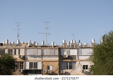 Typical Architecture  With Old Buildings Facade In Israel. Sun Heat Water Boilers On Roofs.