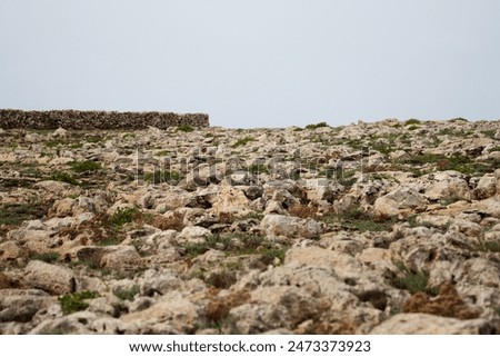 Similar – Image, Stock Photo Typical, barren landscape in southwest Iceland with bare mountains in solitude