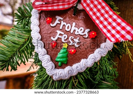 typical bavarian ginger bread heart - translation: merry christmas