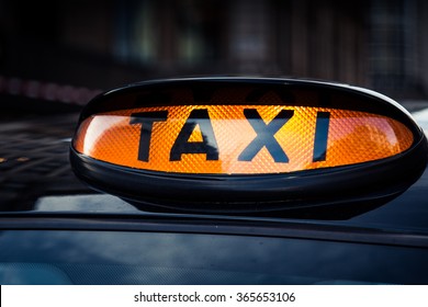 Typical Black Taxi Cab In Central London