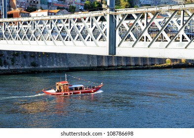 Typical Boat Passing Under The Bridge