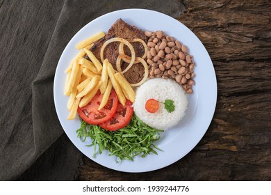 Typical Brazilian food dish Top view. - Shutterstock ID 1939244776