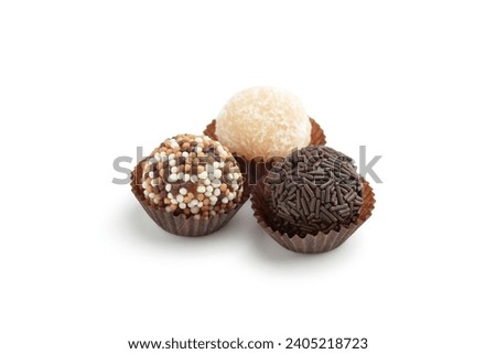 Typical Brazilian sweet brigadeiro. Assorted flavors of candies on a white background