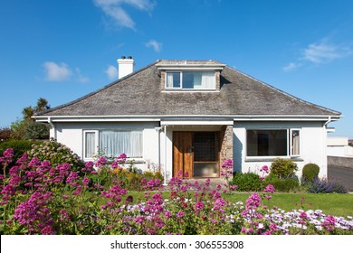 Typical bungalow house with garden