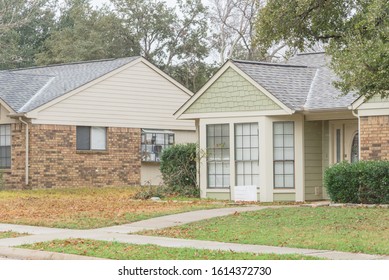 Typical Bungalow House Under Winter Snow Cover Near Dallas, Texas. Middle Class Residential Home In America.