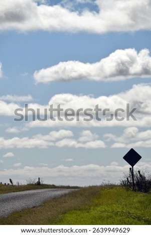 typical cloudy day as nimbus clouds form in rows during the morning in the South Burnett, Queensland, Australia