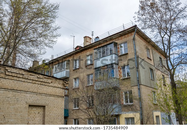 Typical
courtyard with residential brick houses  built up in the early  60s
of the 20th century  in  USSR (Russia). Such buildings are commonly
called Khrushchev’s houses, or
khrushchevka
