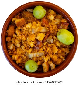 Typical Dish Of Castile And Leon Cuisine - Migas Pastoriles From Fried Bread Crumbs With Diced Chorizo And Bacon Served With Grapes. Isolated Over White Background