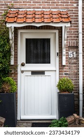 Typical dutch door. Dutch holland architectural detail, a door in Netherlands city. Dutch door