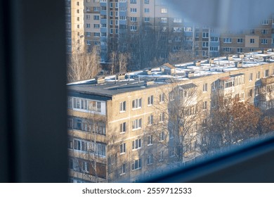 Typical eastern european city seen trough window at winter - Powered by Shutterstock