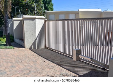 A typical electric fence and gate in an upscale residential area in pretoria south africa 