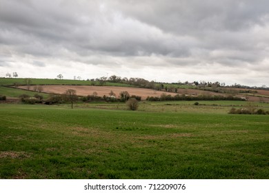 A Typical English UK Green Countryside Landscape Mixed Land Use Woods And Farming