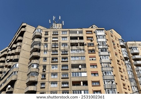 Typical facade of concrete panel building. Post Soviet flat of blocks