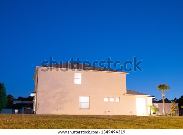 A typical Florida house at\
night