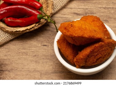 Typical Food From Bahia Called Acarajé Surrounded By Red Peppers And Vatapá - Acaraje