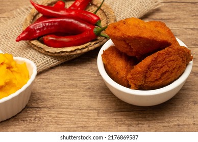 Typical Food From Bahia Called Acarajé Surrounded By Red Peppers And Vatapá - Acaraje