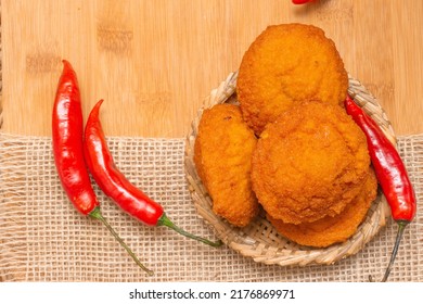 Typical Food From Bahia Called Acarajé Surrounded By Red Peppers And Vatapá