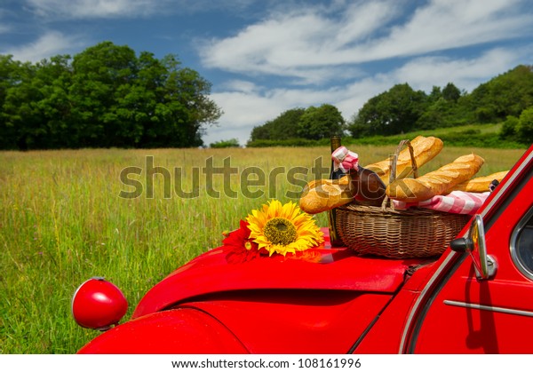 Typical French\
car with bread and wine for\
picnic