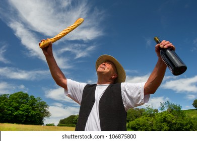 Typical French Man With Bread And Wine