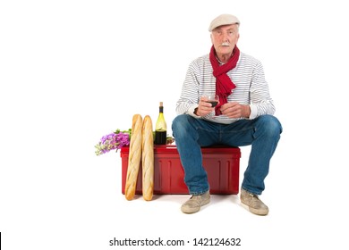 Typical French Man With Bread And Wine Isolated Over White Background