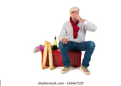 Typical French Man With Bread And Wine Isolated Over White Background