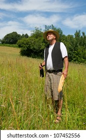 Typical French Man In Nature With Bread And Wine