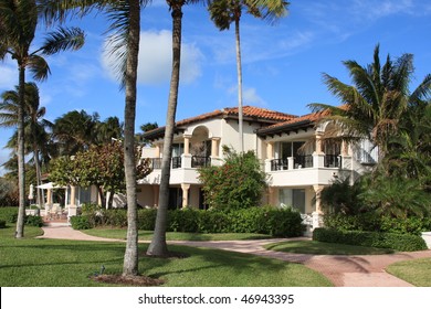 Typical gated community residence in South Florida, with winding pink sidewalks
