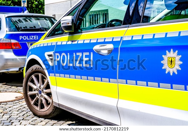 typical\
german police car at the old town of\
munich