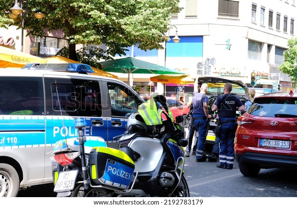 typical german police cars, motorbikes on streets of
germany, frankfurt am main law enforcement officers guarding order
on vehicles, demonstrations, rallies, investigating crimes,
Frankfurt - May 2022