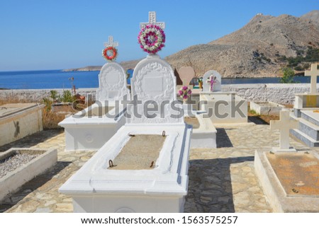 Typical Gravesite Decorations at the Cemetry of Emborios (Imborios) on the greek Island of Chalki (Halki), 9 km North of Rhodes