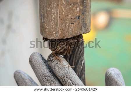 The typical hazard for the seafarer during deck cargo operations between the platform support vessel and the rig or jetty. The rusty tiny wire threads may cause a serious hand injury if no gloves